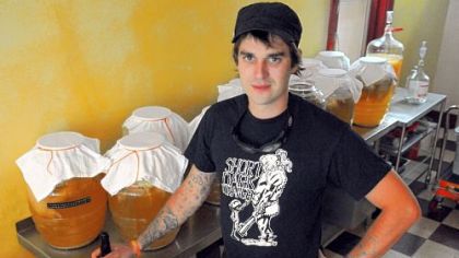 Co-owner Joe Reichenbacher among the globs in jars of the fermented tea at Red Star Kombucha on Troy Hill.
