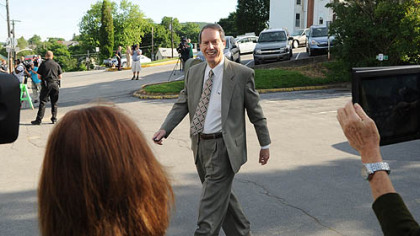 Attorney for Jerry Sandusky, Joe Amendola smiles as he walks into the courthouse for the fourth day of Sandusky's trial at the Centre County Courthouse Thursday.