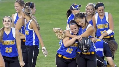 Canon-McMillan teammates celebrate their WPIAL title game victory against Hempfield on May 31.