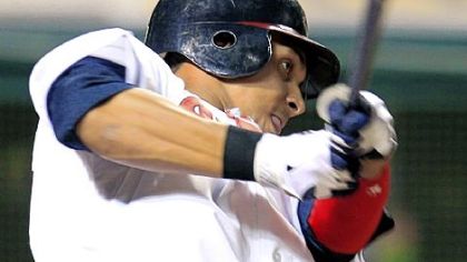 The Indians' Michael Brantley hits a run-scoring single off Pirates pitcher Juan Cruz in the eighth inning Friday in Cleveland.