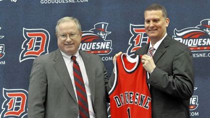 Duquesne president Charles Dougherty introduces Jim Ferry as the new men's basketball coach April 12.