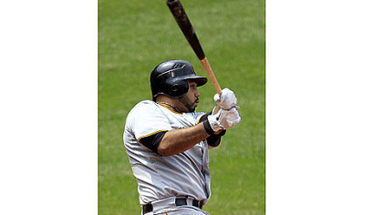 The Pirates' Pedro Alvarez watches his ball after hitting a three-run home run off Cleveland Indians relief pitcher Esmil Rogers in the fifth inning.