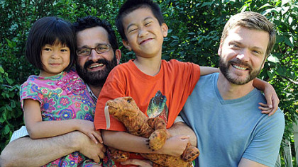 Ray Yeo and Mark Friedman with their kids, Lilly and Ben.