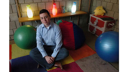 Dr. Luis von Ahn, Assistant Professor of Computer Science at Carnegie Mellon University in his office.