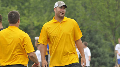 Steelers quarterback Ben Roethlisberger watches youths work out at his football camp.