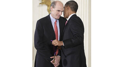 President Barack Obama presents a 2010 National Medal of Arts to Mr. Taylor on March 2, 2011, during a ceremony in the East Room of the White House in Washington.