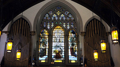 One of the Tiffany windows at Calvary United Methodist Church on the North Side depicts the apostle John and images from The Book of Revelation.