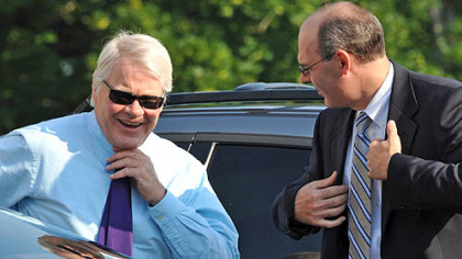 Senior Deputy AG and lead prosecutor Joe McGettigan (left) and Deputy Attorney General Frank Fina arive at the Centre County Courthouse for the seventh day of testimony in the Jerry Sandusky trial Wednesday morning.