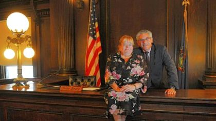 Katherine Emery and husband Gary Gilman, both Washington County Common Pleas Court judges, pose for a portrait inside Ms. Emery?s courtroom.