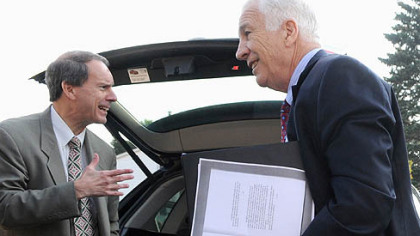 Jerry Sandusky, right, and his lawyer, Joe Amendola, arrive at the Centre County Courthouse Wednesday morning.