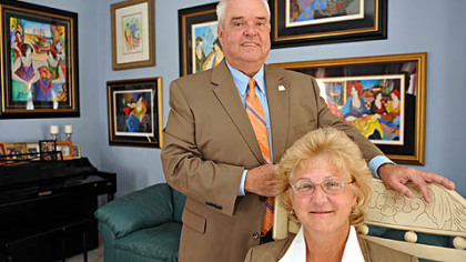 William and Monica Merrell in their Peters home. He is a Peters Township school board member; she is a councilwoman for the municipality.