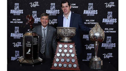 Evgeni Malkin of the Penguins poses with Ted Lindsay after winning the Ted Lindsay Award, the Art Ross Trophy and the Hart Trophy during the 2012 NHL Awards at the Encore Theater at the Wynn Las Vegas.