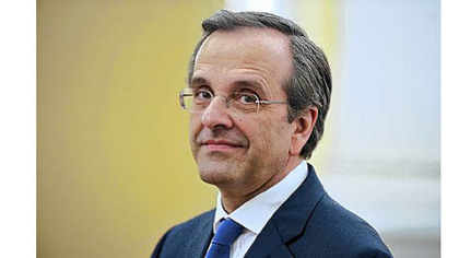 Newly elected Prime Minister Antonis Samaras looks on during his swearing-in ceremony Wednesday at the presidential palace in Athens.
