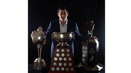 Evgeni Malkin of the Penguins poses Wednesday after winning the Hart Trophy, the Art Ross Trophy and the Ted Lindsay Award during the 2012 NHL Awards at the Encore Theater at the Wynn Las Vegas.