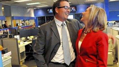KDKA reporter Marty Griffin and wife KDKA anchor Kristine Sorenson talk in the newsroom last week.
