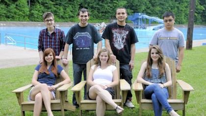 Students in Mike Magri's Technology Club from Keystone Oaks High School pose with the Adirondack chairs they made and donated to the Dormont Pool earlier this month.