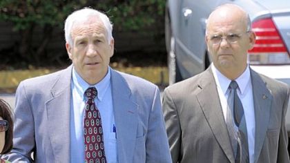 Jerry Sandusky leaves the Centre County Courthouse after the jury began deliberating his case Thursday afternoon.