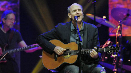 James Taylor sings "Caronlina In My Mind" in concert at the Petersen Center.
