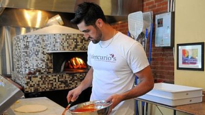 Michael Mercurio prepares pizzas at Mercurio's Gelato and Pizza in Shadyside.