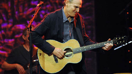 James Taylor performs "Country Roads" in concert at the Petersen Center.