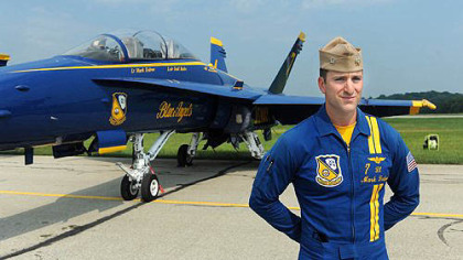 Blue Angels pilot and Charleroi native Lt. Mark Tedrow in front of his F-18 fighter jet Thursday at the Arnold Palmer airport.