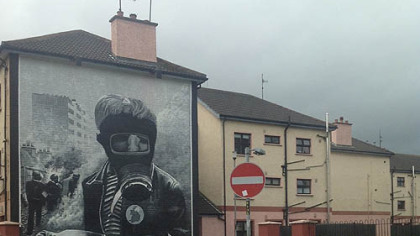 A mural on what is known as Free Derry Corner of a young boy with a gas mask and petrol bomb at the height of 1969 riots between Catholic residents and the Royal Ulster Constabulary.