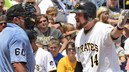 Pirates Casey McGehee argues the third strike with home plate umpire Marty Foster against the Tigers this afternoon at PNC Park.
