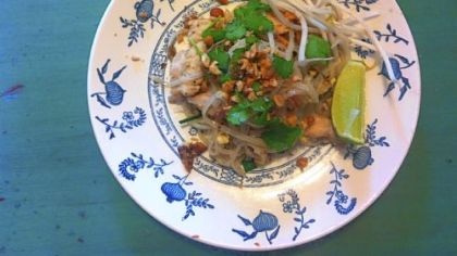 Phurit Saengthong-aram's Pad Thai, garnished with crushed peanuts,  cilantro and a wedge of lime.