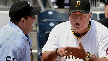 Pirates manager Clint Hurdle argues called third strike on Casey McGehee with home plate umpire Marty Foster against the Tigers Sunday afternoon at PNC Park.