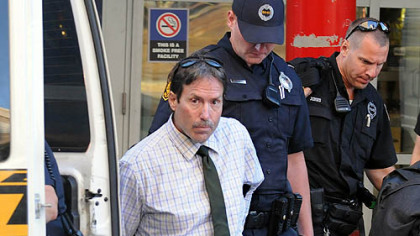 Paul Berard, 51, is taken into custody after a  woman was stabbed early Tuesday morning.