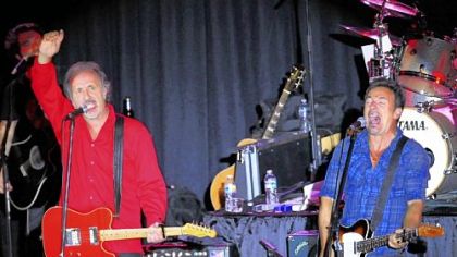 Joe Grushecky, left, seen with Bruce Springsteen in November, will kick off a new summer concert series set for Fridays in Market Square.