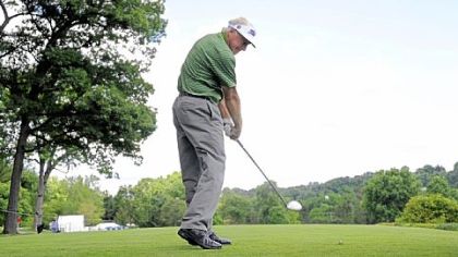 Bruce Vaughan hits off the first tee to begin a practice round Tuesday in anticipation of the first round Thursday of the Constellation Senior Players Championship at Fox Chapel Golf Club.