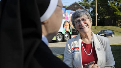 Sister Simone Campbell, right, executive director of NETWORK, talks to Sister Jeanne Marie Ulica today outside Sisters Place.