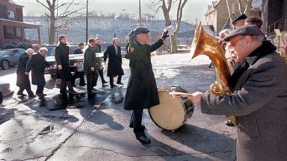 One of South Fayette's first band directors, Dominic Scacchitti, plays baritone at right at the 1997 funeral of a former band director. Band alumni created a scholarship in his name.
