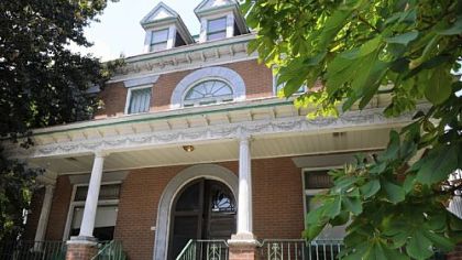 Many of the period details remain in this Victorian house in Knoxville, originally a single-family home buit in the late 1800s. It is now divided into five apartments and is on the market for $80,900.
