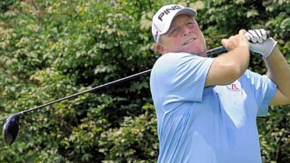 Mark Calcavecchia shot his way into a share of the lead Saturday with a 64.