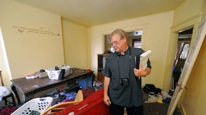 Craig Edwards does a walk through at this hoarder house on east 9th Ave in Munhall.