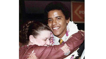 Barack Obama gets a hug from his grandmother, Madelyn Lee Payne Dunham, in 1979 at his high school graduation in Hawaii. She died Nov. 2, 2008, two days before her grandson was elected president.