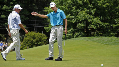 Co-leader Joe Daley tries to coax his putt into the cup on No. 6 Saturday at Fox Chapel Golf Club.