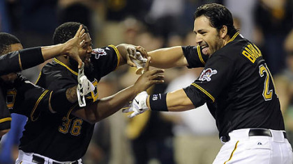 Pirates catcher Rod Barajas is congratulated at home plate after hitting a two-run walk off home May 9 at PNC Park.