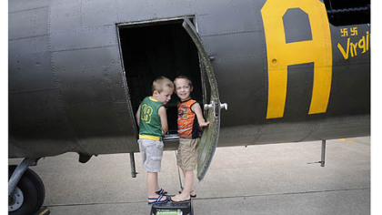 Charles and Eric Tomovcsik of McKeesport check out the Memphis Belle.