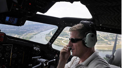 Pilot Ray Fowler flies a B-17 from the movie "Memphis Belle" over Pittsburgh.