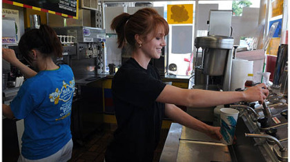 Margie Page of Page Dairy Mart on the South Side enjoys her work and the customers.