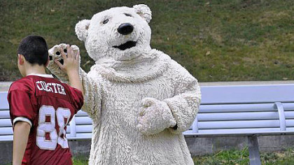 Tessa Flannery, dressed as a polar bear, greets people at Point State Park during the EQT Pittsburgh Three Rivers Regatta on Wednesday.