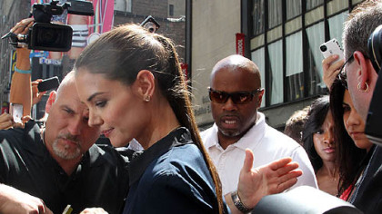 Katie Holmes leaves a TV studio on Times Square in New York on Monday.