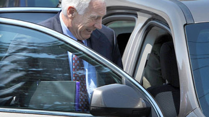 Jerry Sandusky leaves the Centre County Courthouse on Wednesday after the defense rested on the seventh day of testimony.