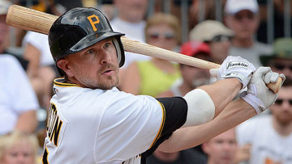The Pirates' Drew Sutton hits a single.