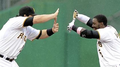 Teammates Rod Barajas and Josh Harrison put their hands together -- the left one on top of the right one with the thumbs extended and touching -- to form a sort of "Z." For Zoltan.