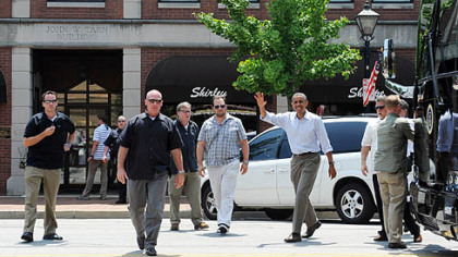 President Obama greets a crowd gathered outside Kretchmar's Bakery on Third Street.