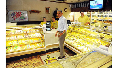 President Obama looks over his options  at Kretchmar's Bakery.
